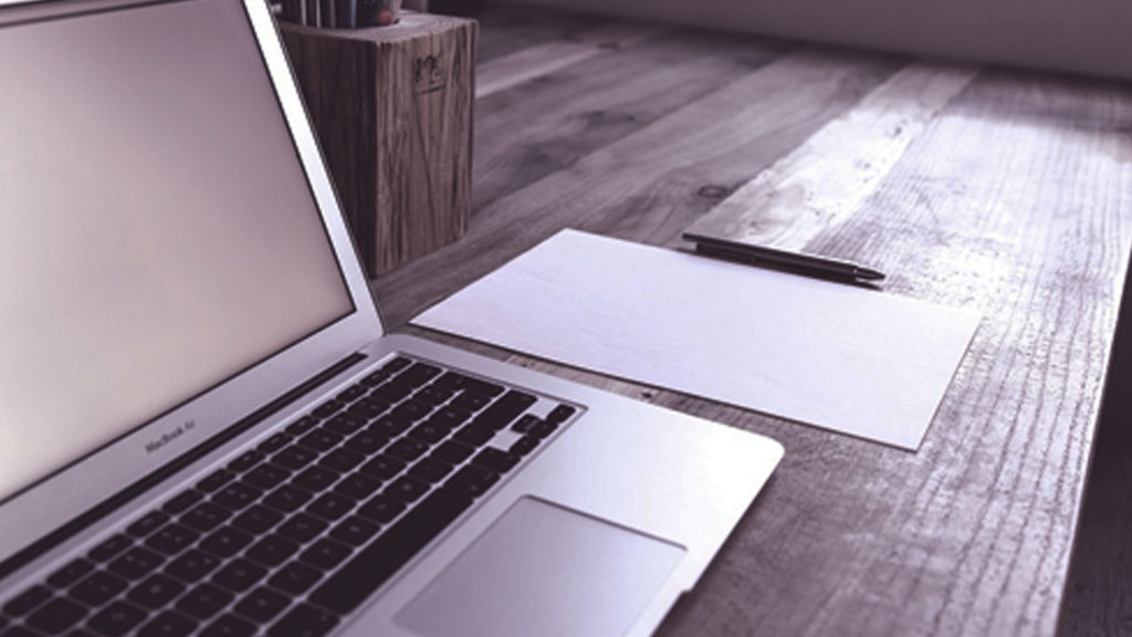 A laptop on a table.